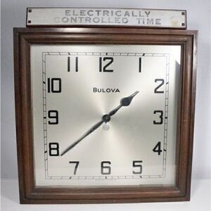 Vintage Antique Bulova Watch Co. electronic wall clock wood glass silver dial
